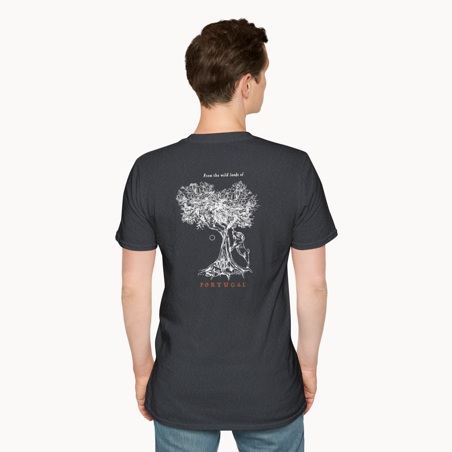 Man wearing Ibex & Olive Tree T-Shirt, featuring olive tree illustration and 'Portugal' text on the back.