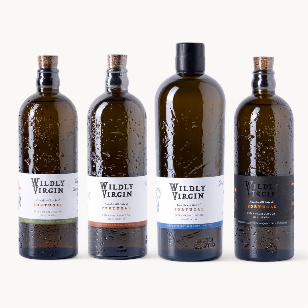Full Harvest Set featuring four bottles of Wildly Virgin olive oil from Portugal, showcasing unique varietals and craftsmanship.