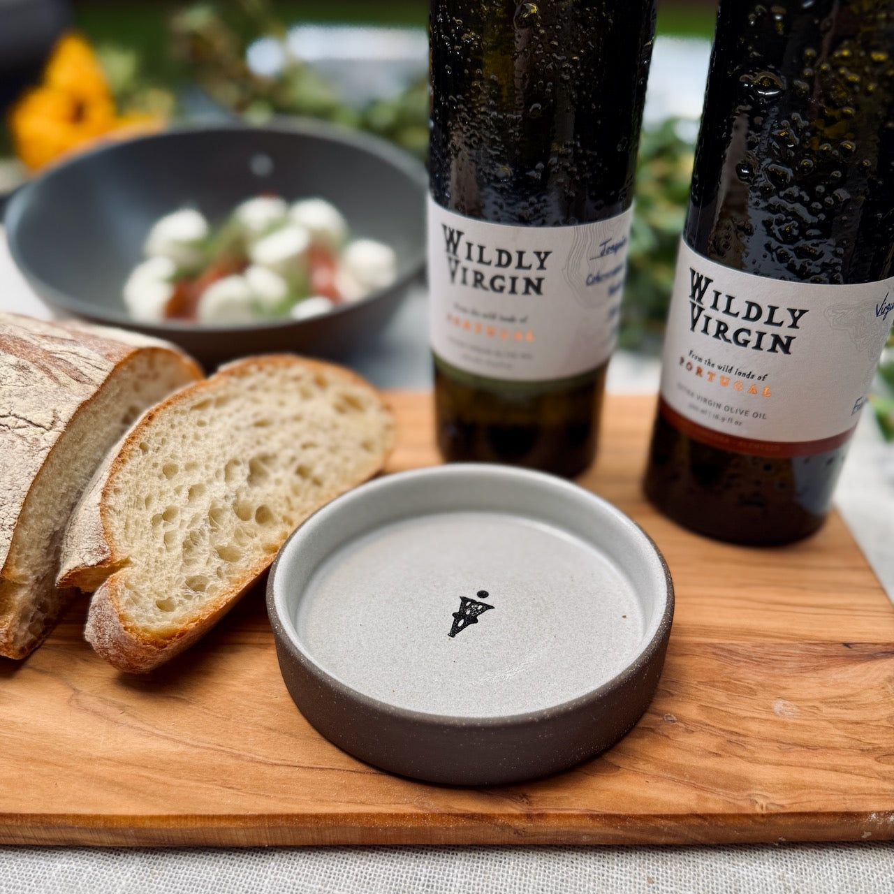 Tour of Portugal Gift Set featuring Wildly Virgin olive oils, artisan bread, and a hand-turned olive oil dish.