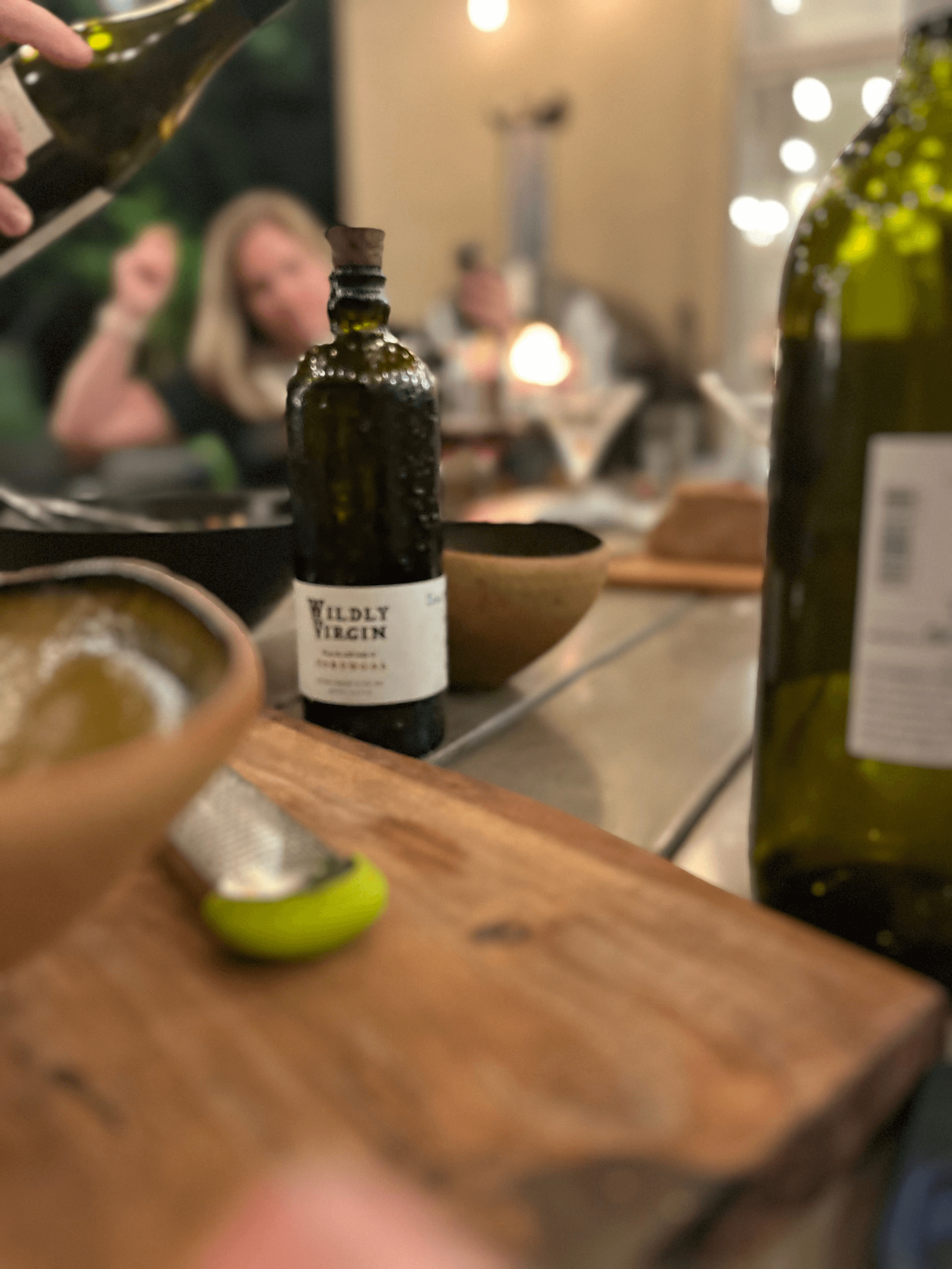 Wildly Virgin olive oil on the table at a dinner party