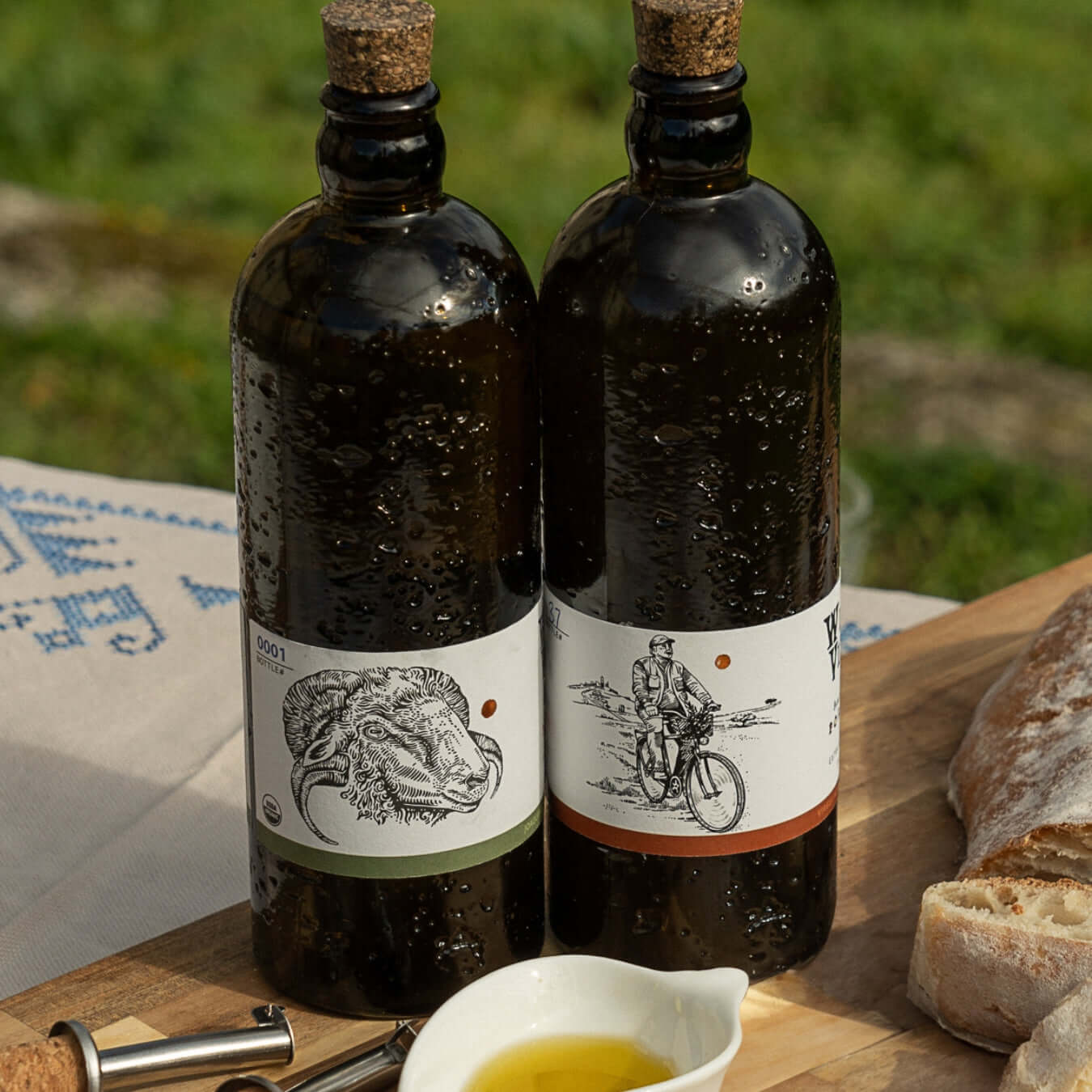 Two bottles of Wildly Virgin Extra Virgin Olive Oil