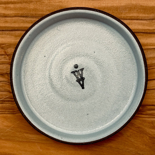 The Olive Oil Dish designed by Jono Pandolfi, featuring a unique ceramic design ideal for showcasing olive oil.