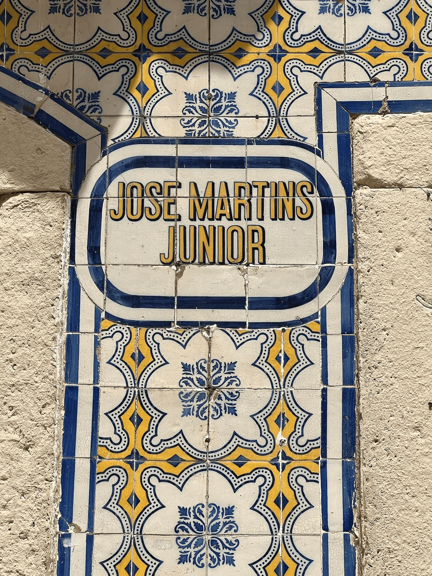 A photo of beautiful painted Portuguese tiles with blues and yellows