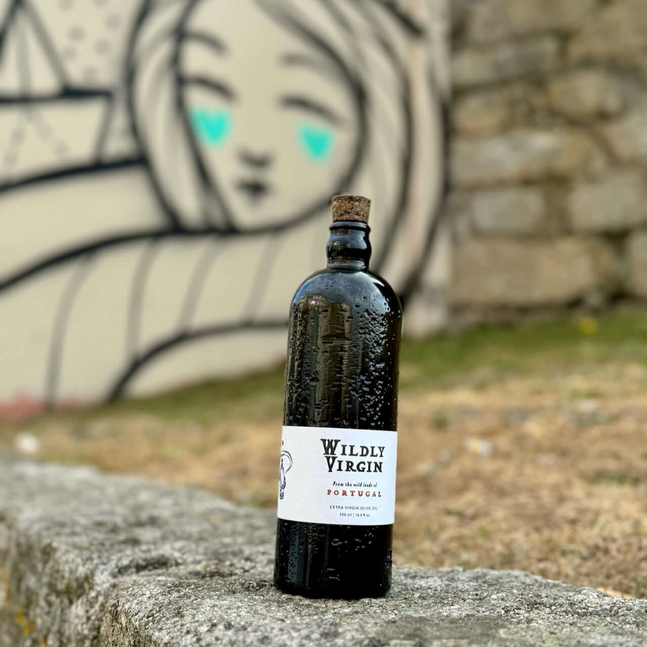 Wildly Virgin Olive Oil on wall with street art