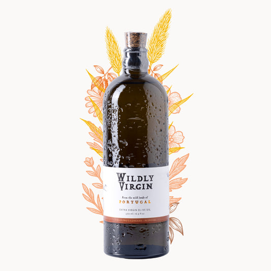 Bottle of Wildly Virgin extra virgin olive oil from Portugal with decorative floral elements.