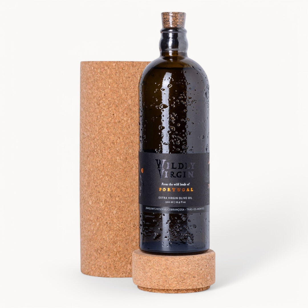 Bottle of Wildly Virgin extra virgin olive oil from Portugal with cork packaging.