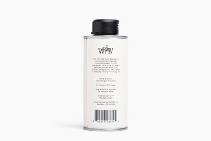 A tall, slender white metal canister with a black screw cap, shown from the back against a clean white background. The label features the stylized 'WY' logo and product details in black text, including 'Cold Water' and '100% Organic Extra Virgin Olive Oil'.