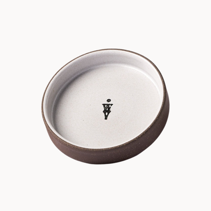 The Olive Oil Dish designed by Jono Pandolfi, featuring a unique ceramic design ideal for showcasing olive oil.