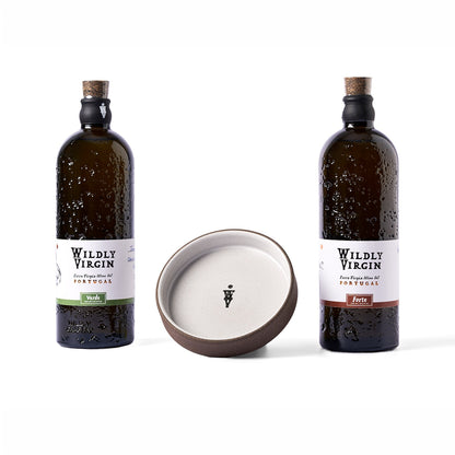 Tour of Portugal Gift Set featuring Wildly Virgin olive oils and a hand-turned dipping dish surrounded by bread and flowers.